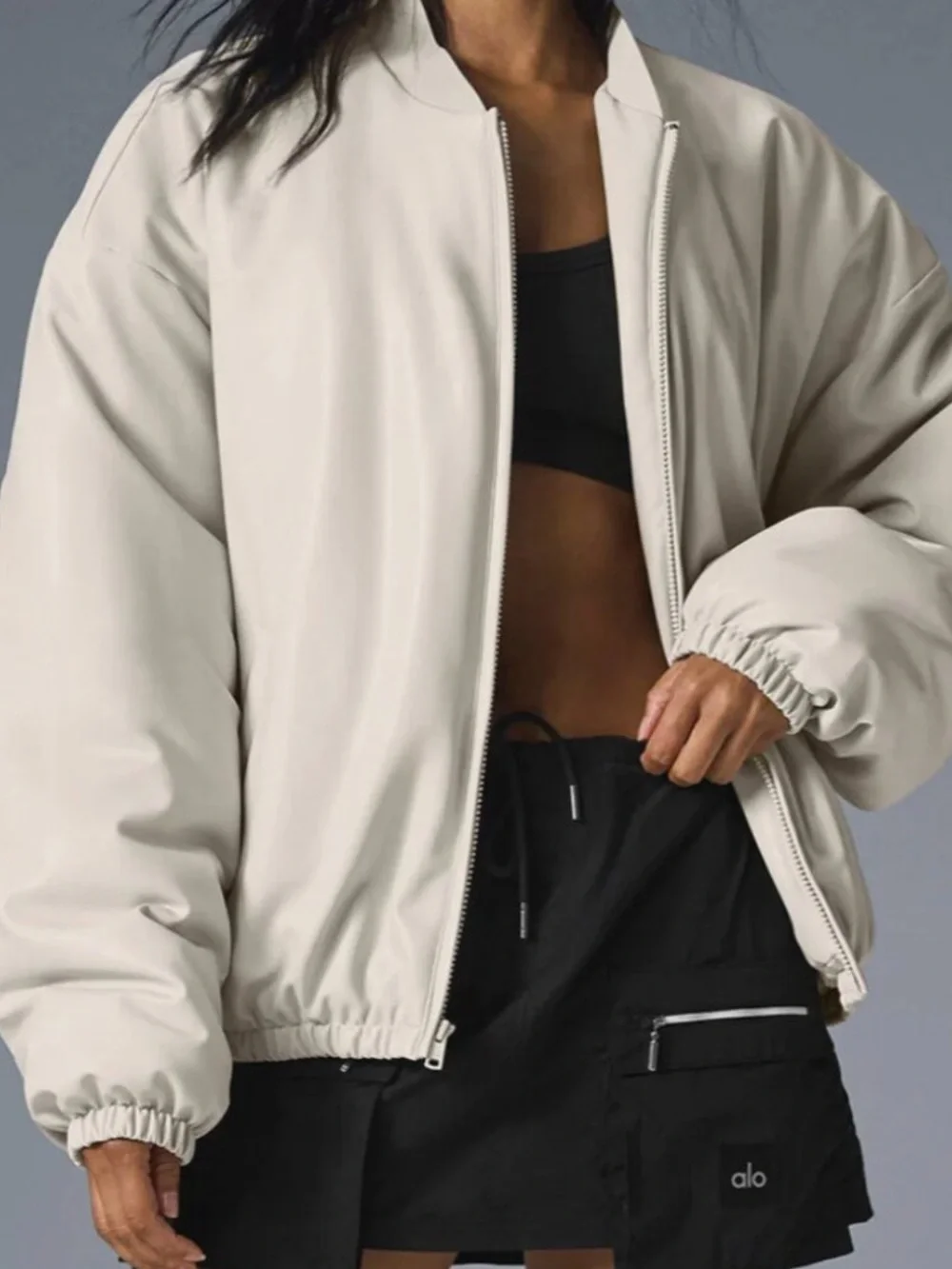 ALO Yoga Faux Leather Premier Bomber Jacket in Bone